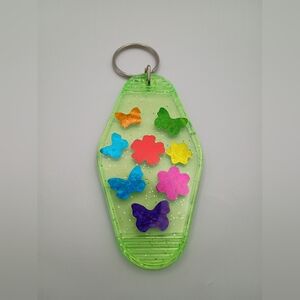 Retro Styled Green Transparent Colorful Butterfly And Flowers Motel Keychain